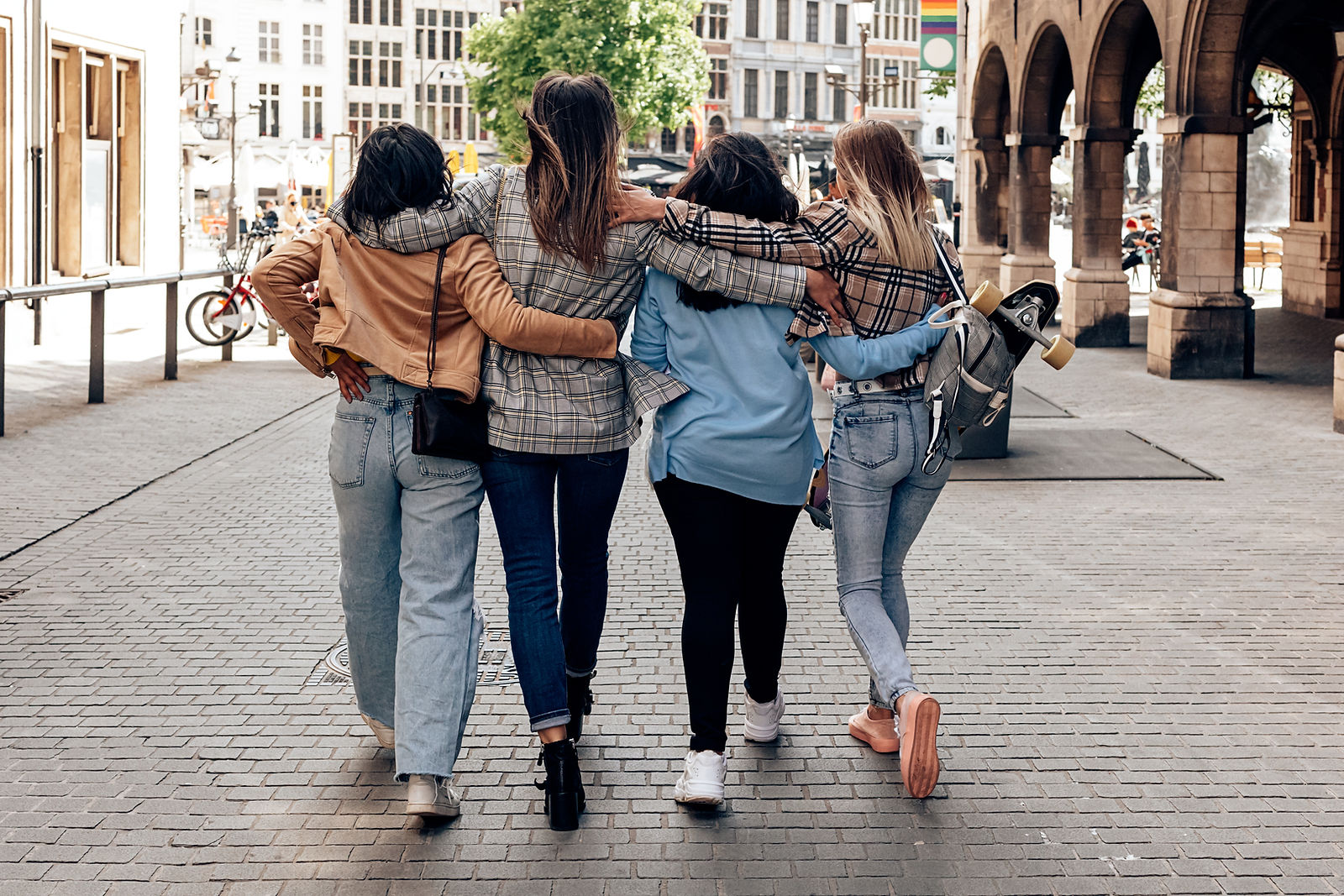 friends walking along the street