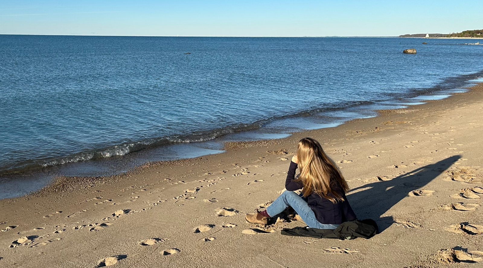 woman sitting at the beach