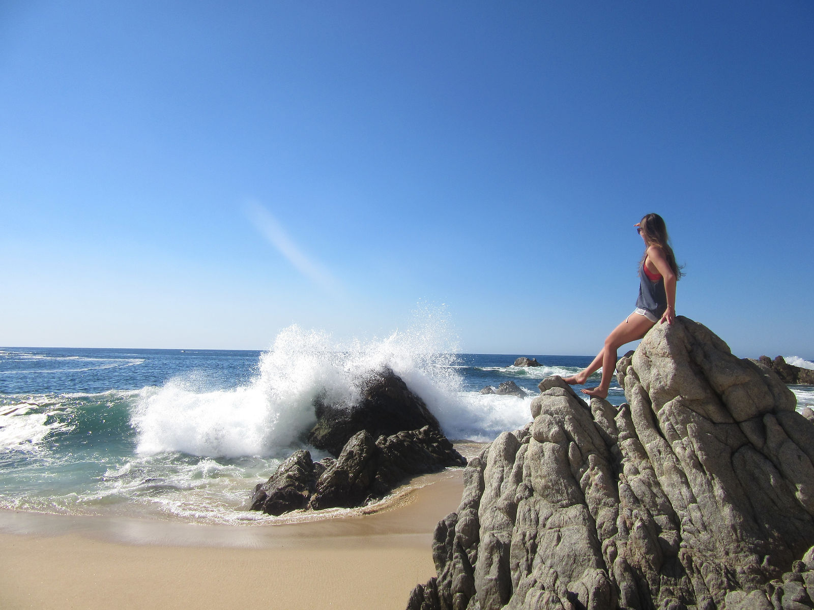 woman looking at the ocean