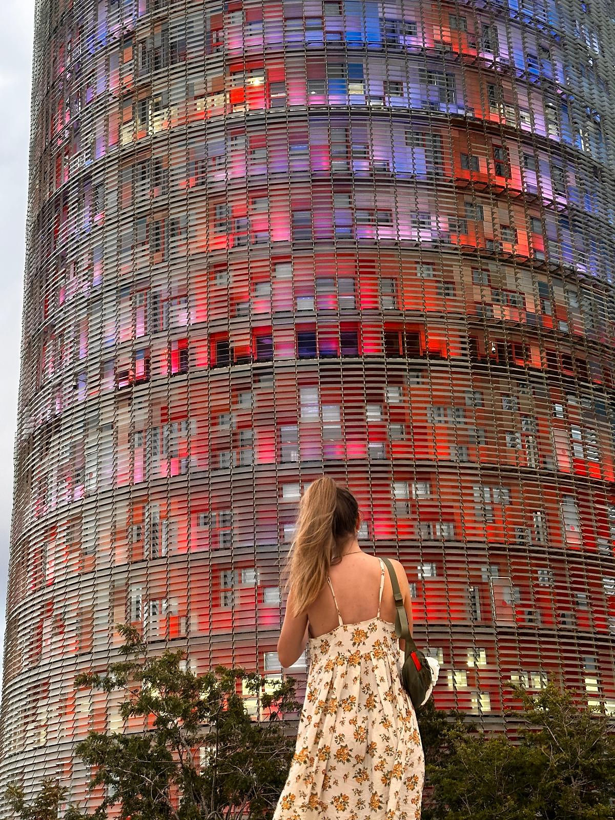 woman in front of tower
