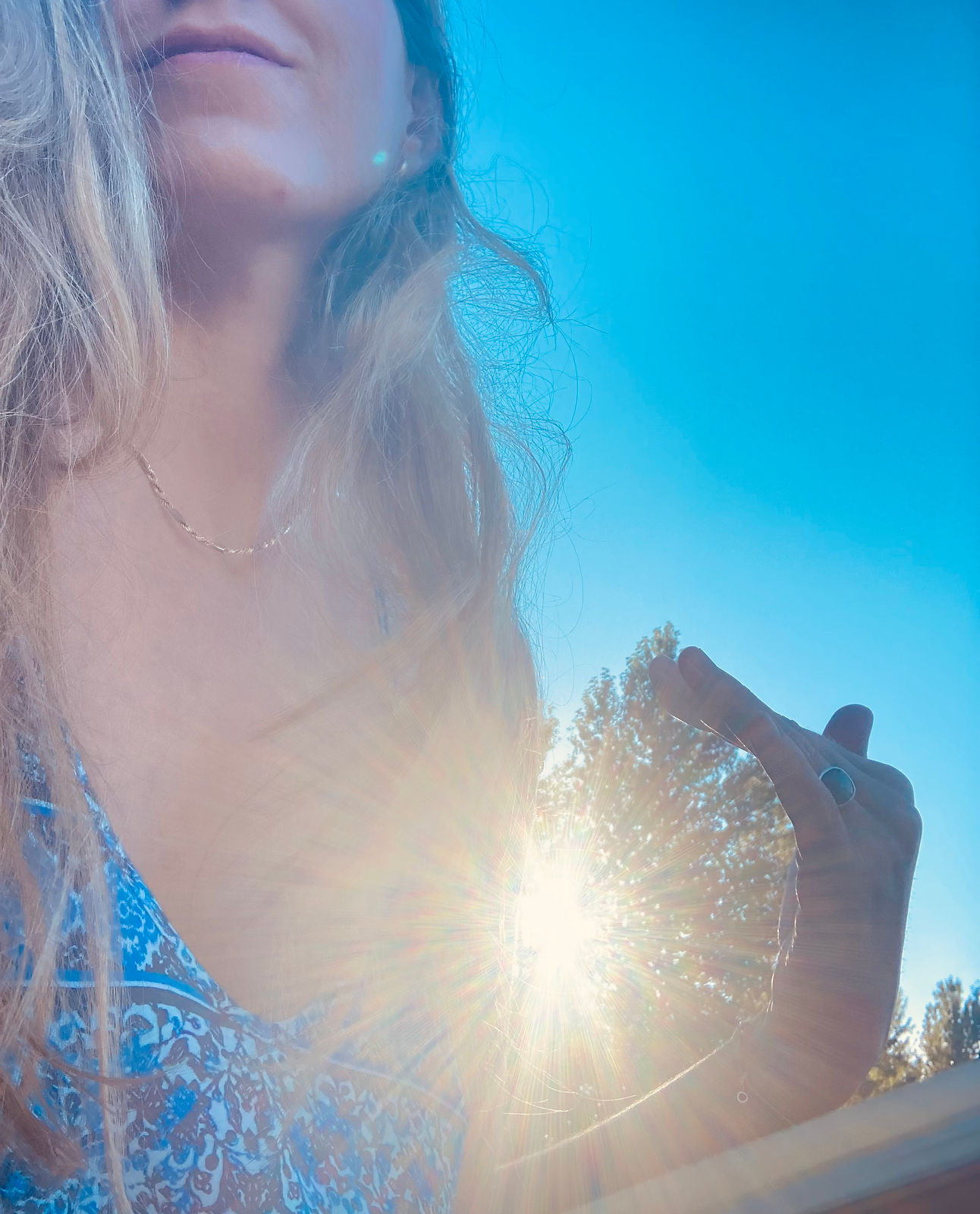 Girl embracing sunset