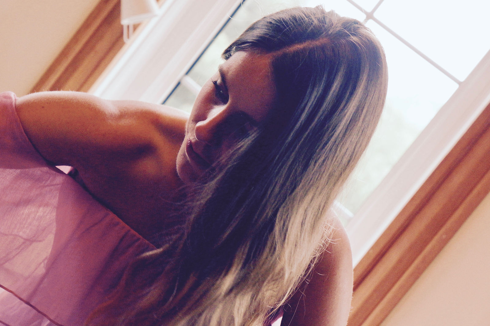 Woman in dress looking down